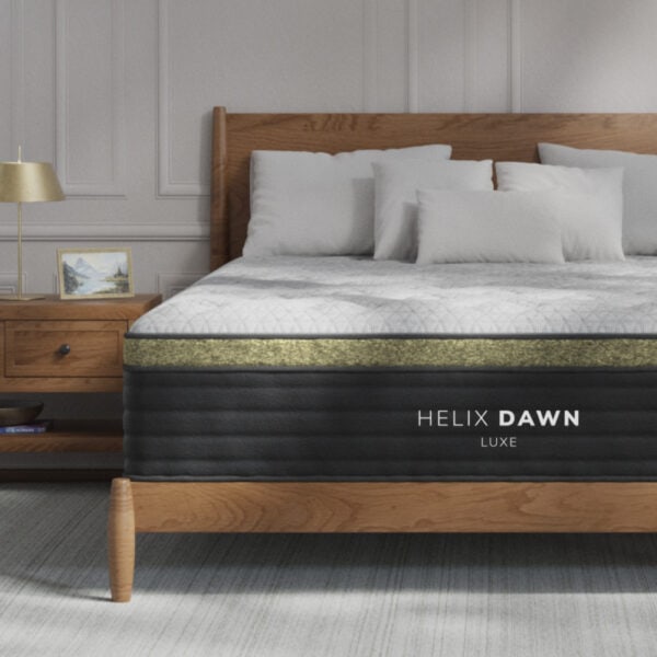Luxurious Helix Dawn mattress on a wooden bed.