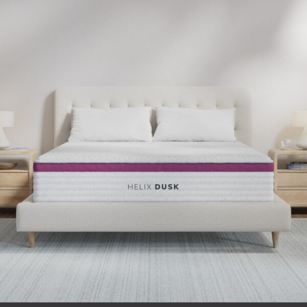 Helix Dusk mattress on upholstered bed in modern bedroom.