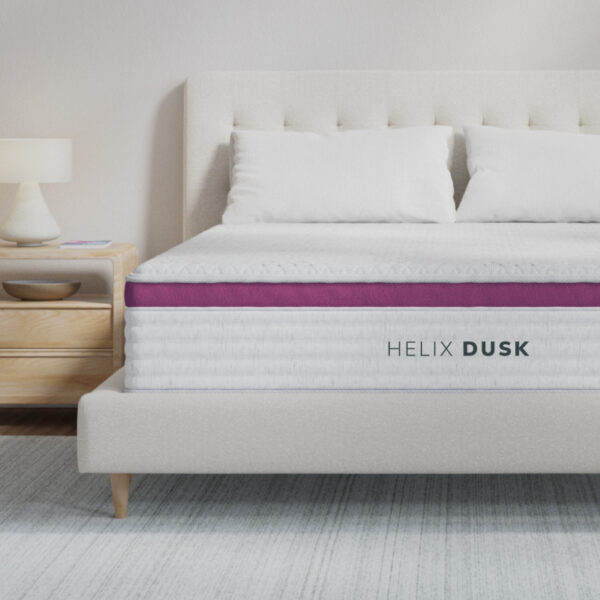 Helix Dusk mattress on modern bed, cozy bedroom scene.