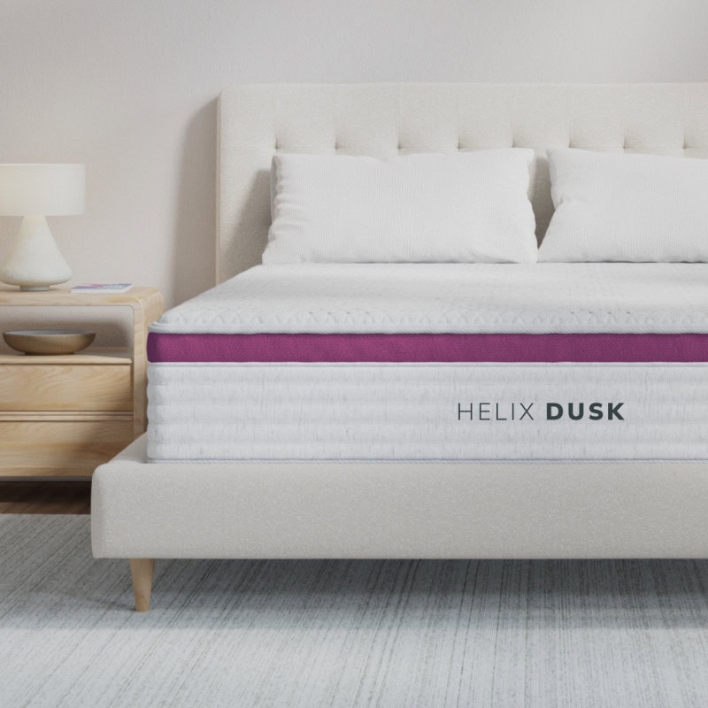 Helix Dusk mattress on modern bed, cozy bedroom scene.