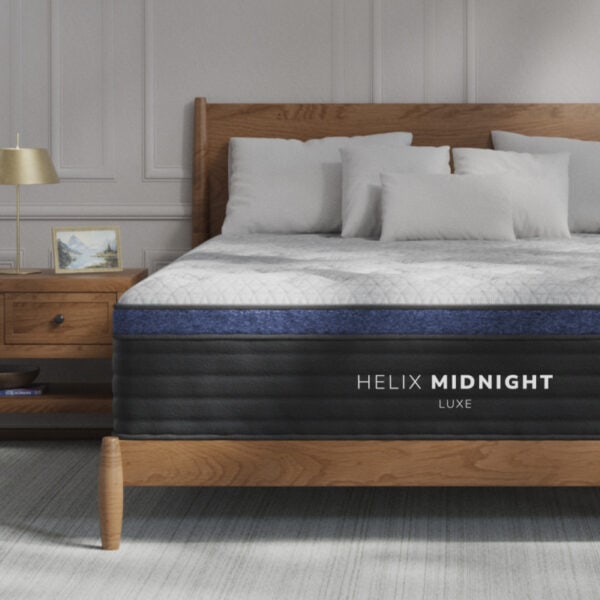 Helix Midnight Luxe mattress on wooden bed frame.