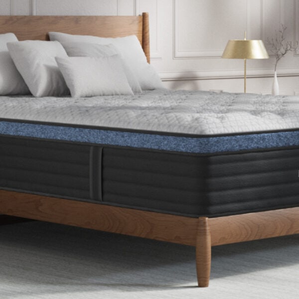Luxury mattress on wooden bed frame