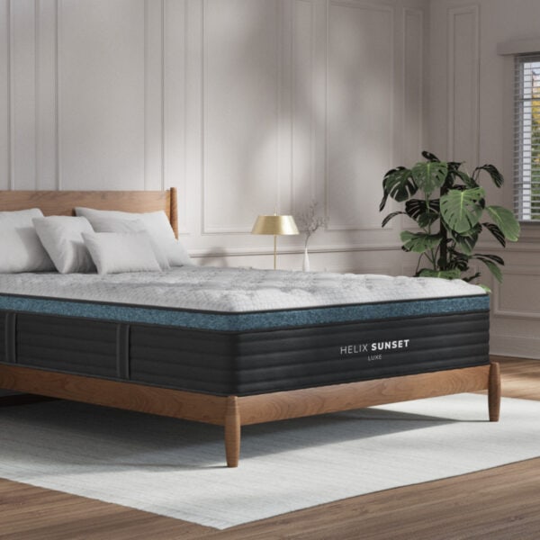 Modern bedroom with Helix mattress and wood bed frame.