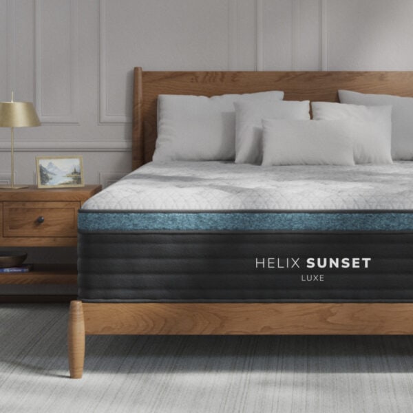 Helix Sunset Luxe mattress on wooden bed frame.
