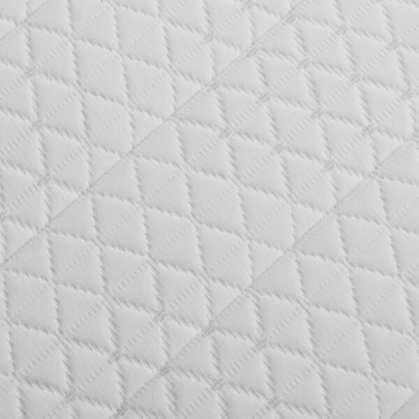 White quilted fabric with diamond pattern