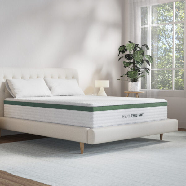 Comfortable mattress in a bright, minimal bedroom.
