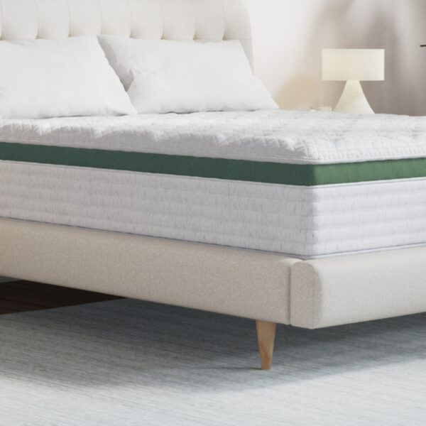 Luxury bed with plush mattress and pillows