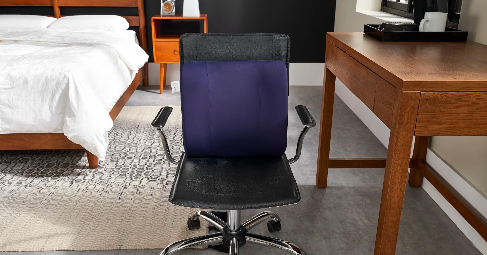 Office chair with lumbar support in a bedroom
